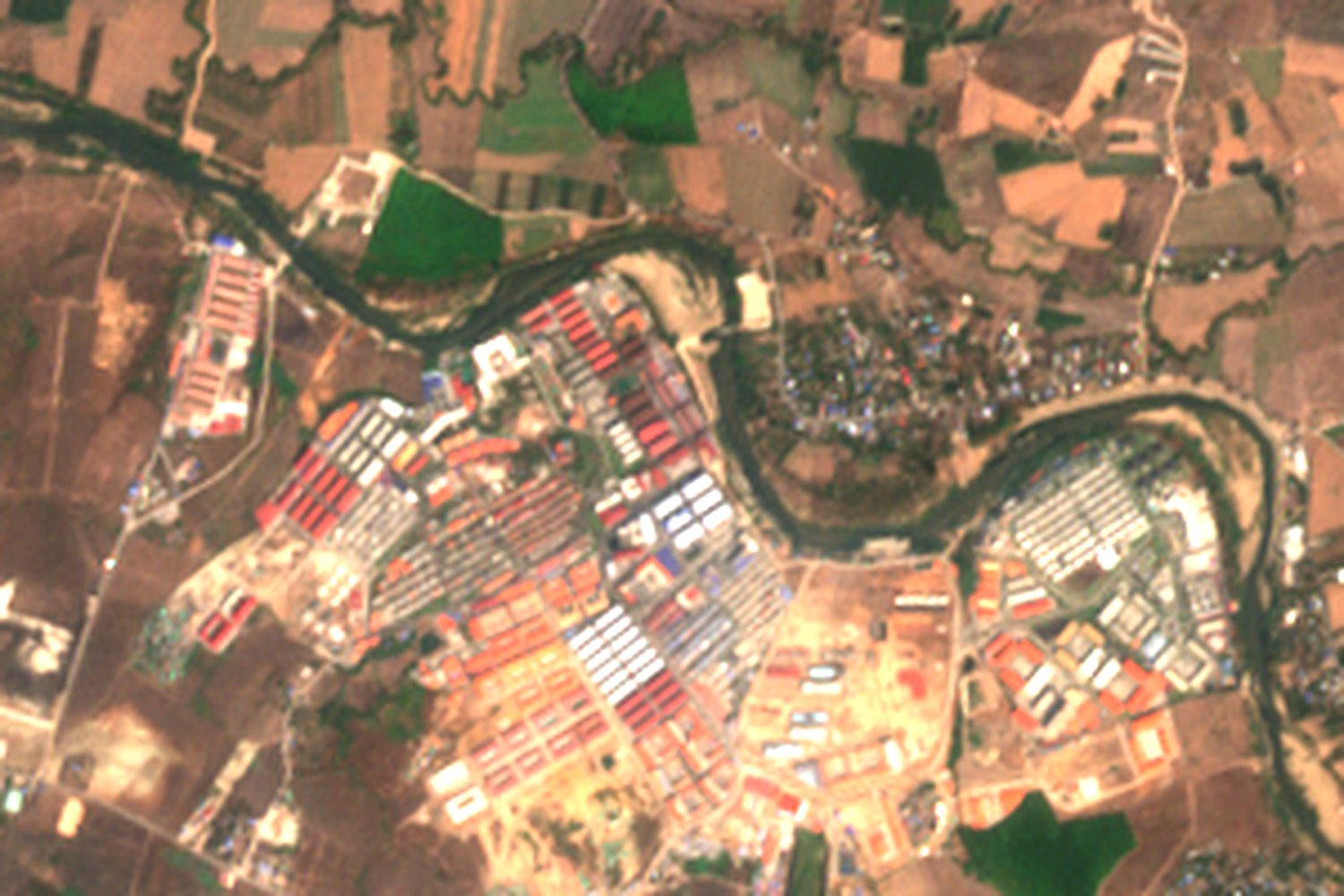Satellite image of KK Park, 4 March 2025, densely built